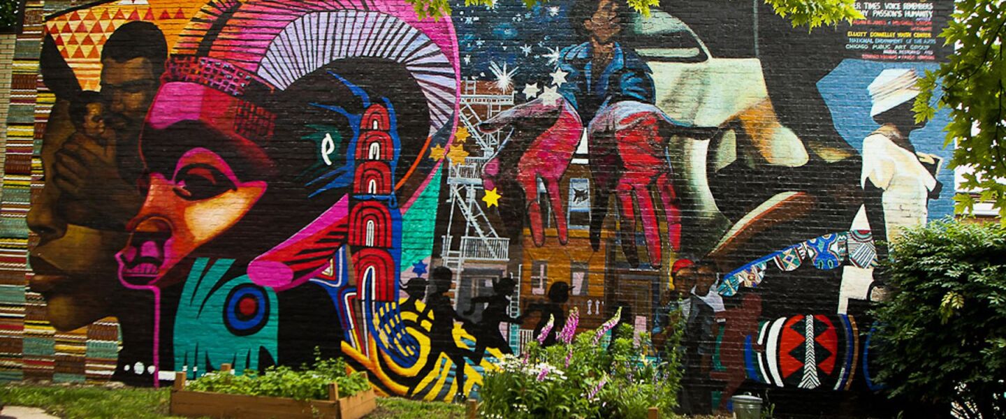 In 1993, Bernard Williams restored this mural at 39th Street and Michigan Avenue by Mitchell Caton and Calvin Jones titled “Another Time’s Voice Remembers My Passion’s Humanity.”