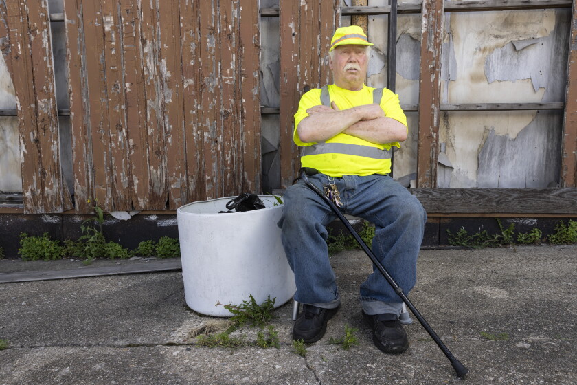 John Romando, a former West Suburban patient, poses for a portrait at his towing business in West Garfield Park on July 1, 2026. Romando is dialysis patient who had to get his care abruptly moved.