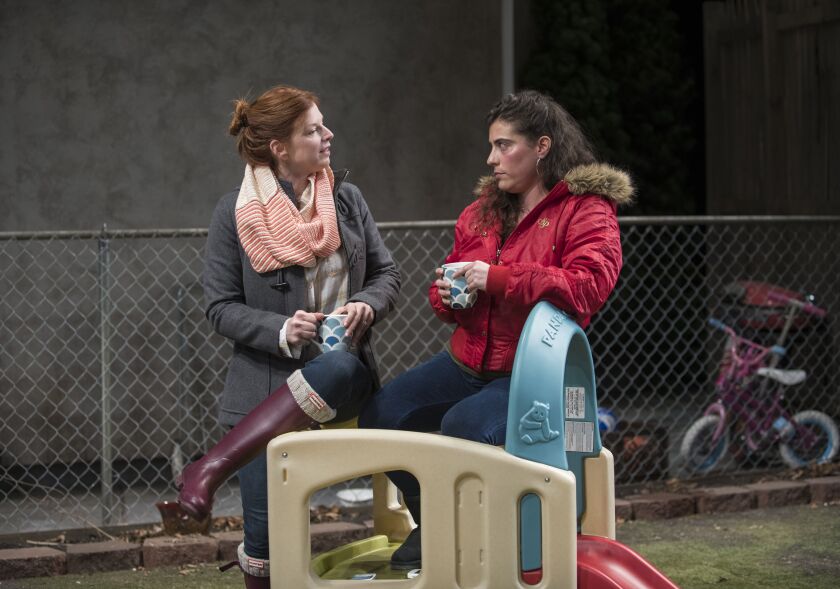 Darci Nalepa and Laura Lapidus star as two new mothers sorting out their lives in “Cry It Out” at Northlight Theatre. | Michael Brosilow