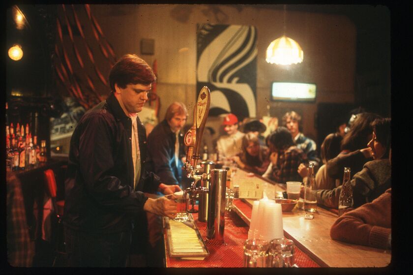 Zay N. Smith, aka Norty the bartender, behind the bar at the Mirage, the bar that the Chicago Sun-Times bought and operated to document graft in Chicago.