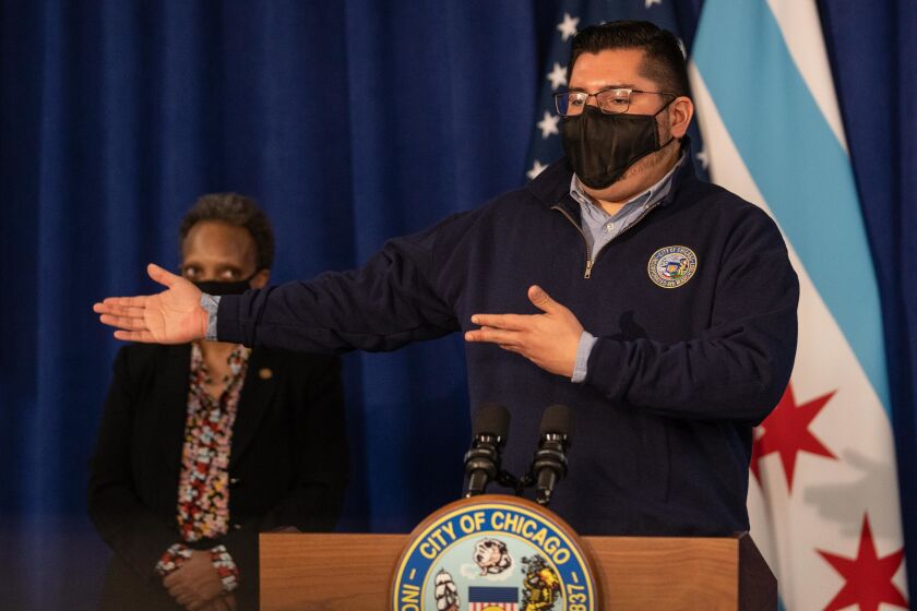 Ald. Carlos Ramirez-Rosa (35th) speaks during a press conference at City Hall in the Loop, Tuesday morning, Feb. 23, 2021, where Chicago Mayor Lori Lightfoot signed a revised version of the Welcoming City Ordinance.