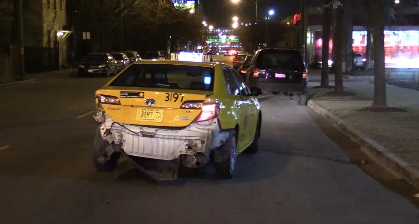A cab was damaged after a stolen car crashed into the bumper and then a sign Thursday night in Lincoln Park. | NVP News