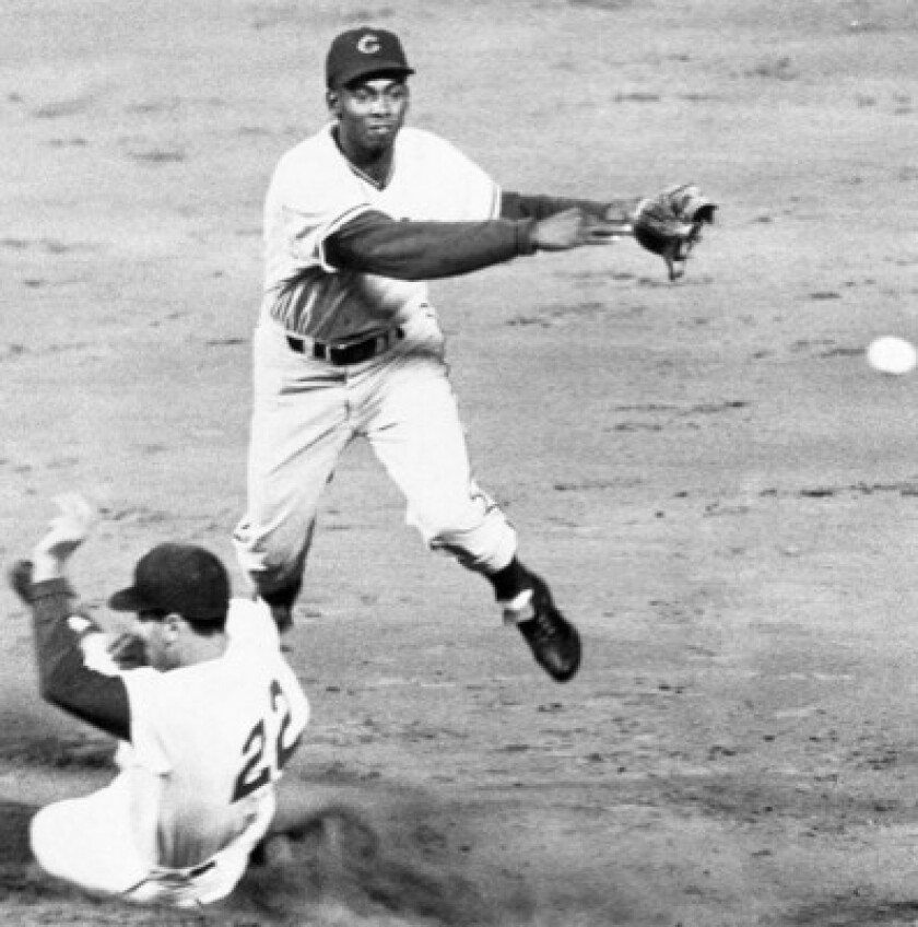Ernie Banks completes a double play on May 9, 1970, in St. Louis. | AP file photo