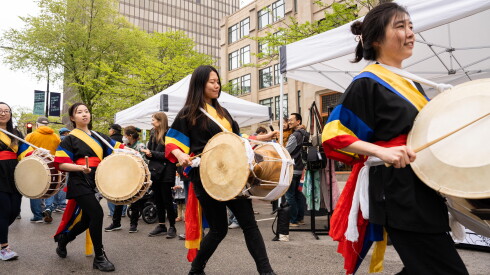 Drummers from HANA Center's Pungmul group perform during the Umbrella Arts Festival at Fountain Square in Evanston, Ill., Saturday, May 13, 2023. The festival, which featured cultural performances, small businesses, food and arts and crafts, aims to celebrate Asian, South Asian and Pacific Islander art and culture and raise awareness to prevent anti-Asian violence, according to their website. | Pat Nabong/Sun-Times