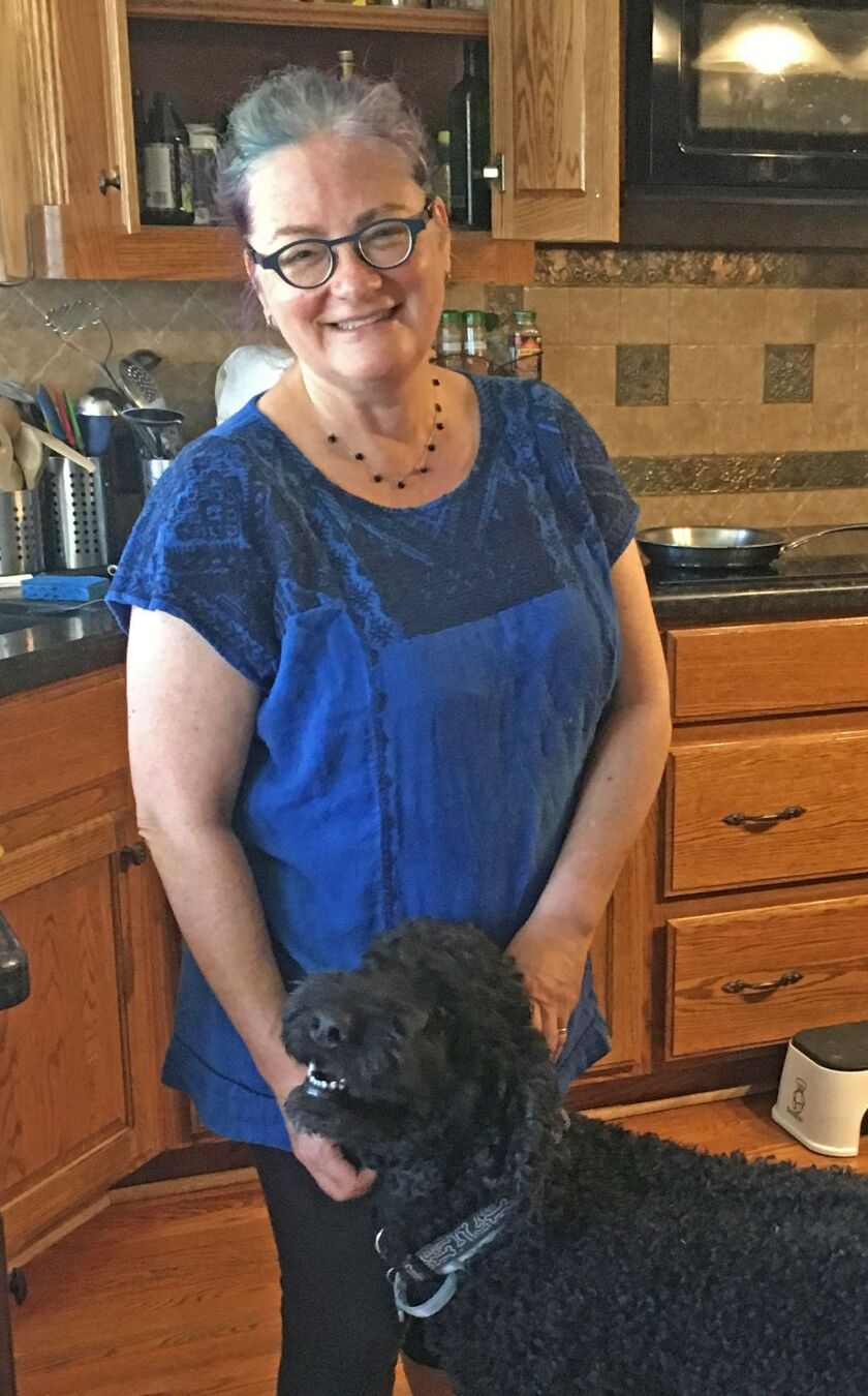 Hannele Rubin, here with dog Rufus, attended Northwestern University’s Medill School of Journalism, and now teaches at Texas A & M University in College Station. | Maudlyne Ihejirika | Sun-Times