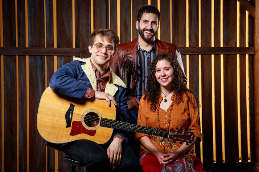Steven Romero Schaeffer (from left), Tommy Malouf and Sara Geist star in “Almost Heaven — John Denver’s America.” Photo by Guy Rhodes