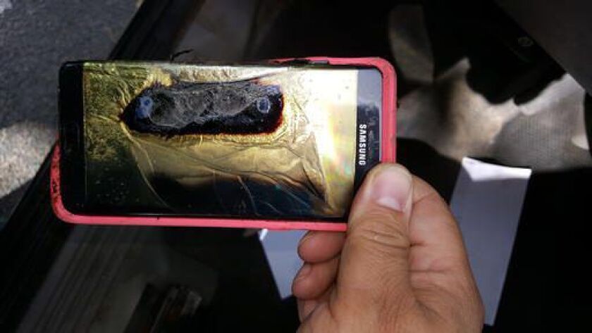 Andrew Zuis, of Farmington, Minn., provided this photo of the replacement Samsung Galaxy Note 7 phone belonging to his 13-year-old daughter Abby, that melted in her hand earlier in the day. | AP