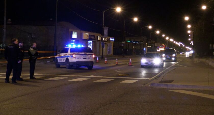 Chicago Police investigate 2 people shot in the 9300 block of Stoney Island Saturday night. | Justin Jackson/ Sun-Times