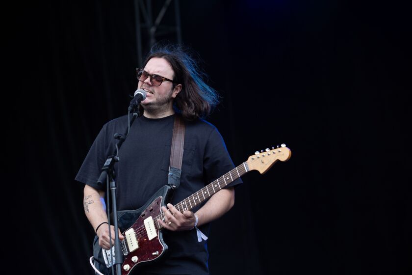 Deeper singer and guitarist Nic Gohl sings during his band’s Green Stage set at Pitchfork.