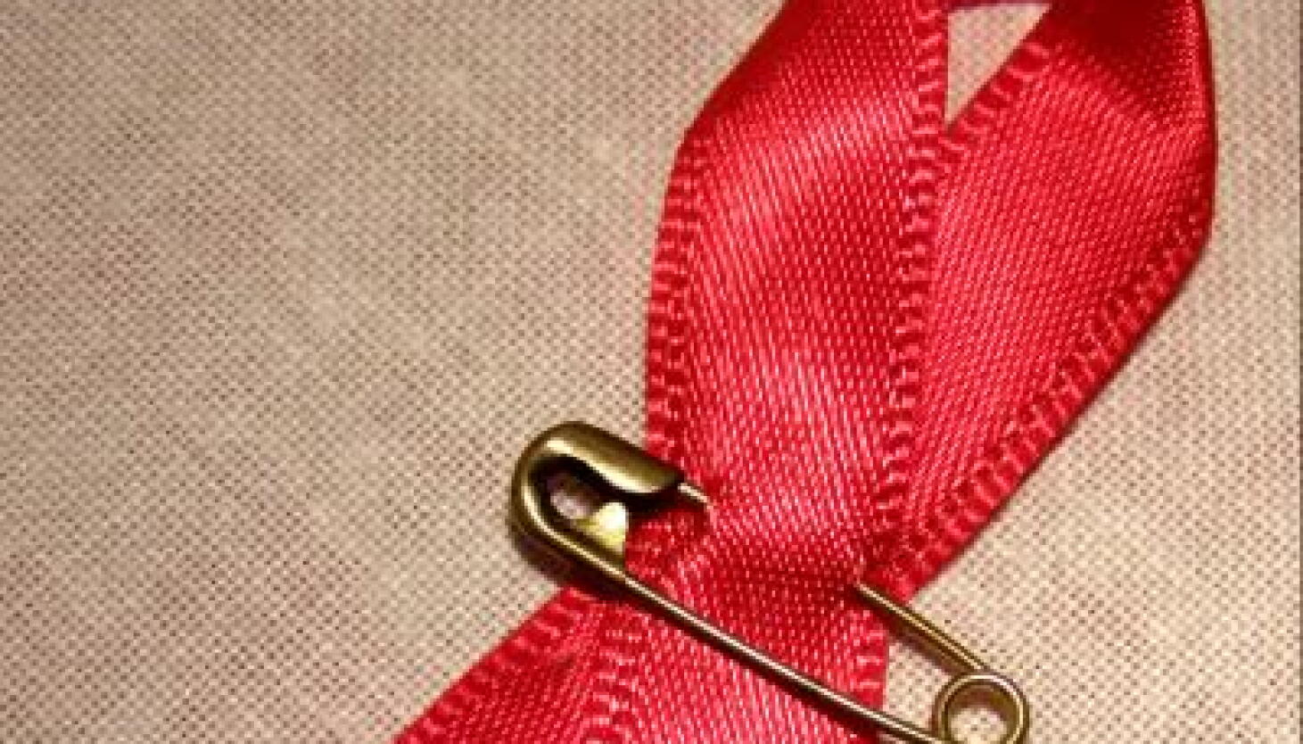 Pidd Ribbon Leaders in Chicago’s HIV and AIDS community call for equitable funding ...