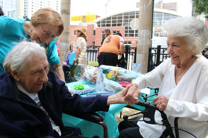 Roller derby legends Sammy Skobel and Mary Lou Palermo reunite in Coliseum Park. | Emily Moon/Sun-Times