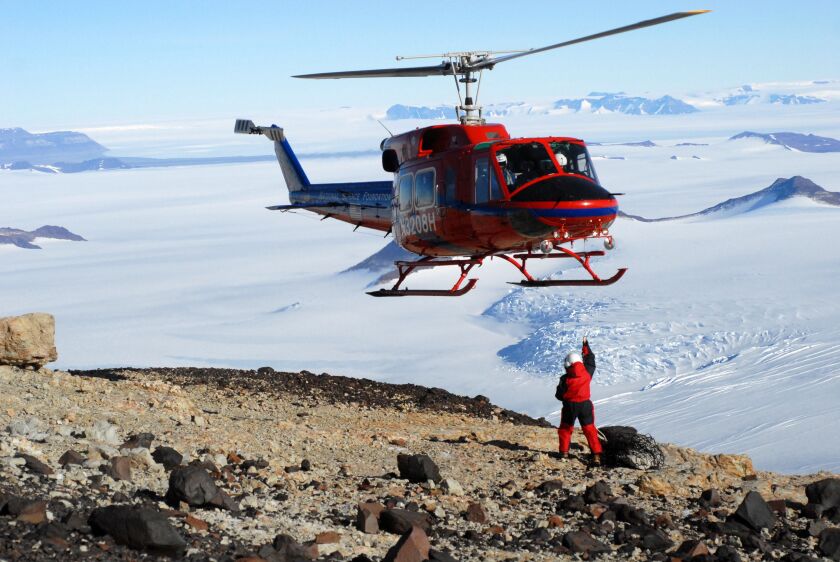A helicopter was used to carry fossil-bearing rocks from Mount Kirkpatrick in Antarctica back to the expedition’s camp. | Field Museum photo