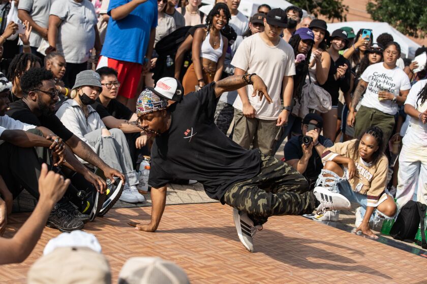 A hip-hop dancer performs during “Youth of Chinatown,” a three-day event featuring hip-hop and K-pop performances at Chinatown Square Plaza, Saturday, Aug. 27, 2022.