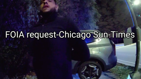 ICE agent Guillermo Diaz-Torres stands in front of a vehicle he is accused of driving under the influence in bodycam footage obtained by the Sun-Times through FOIA.