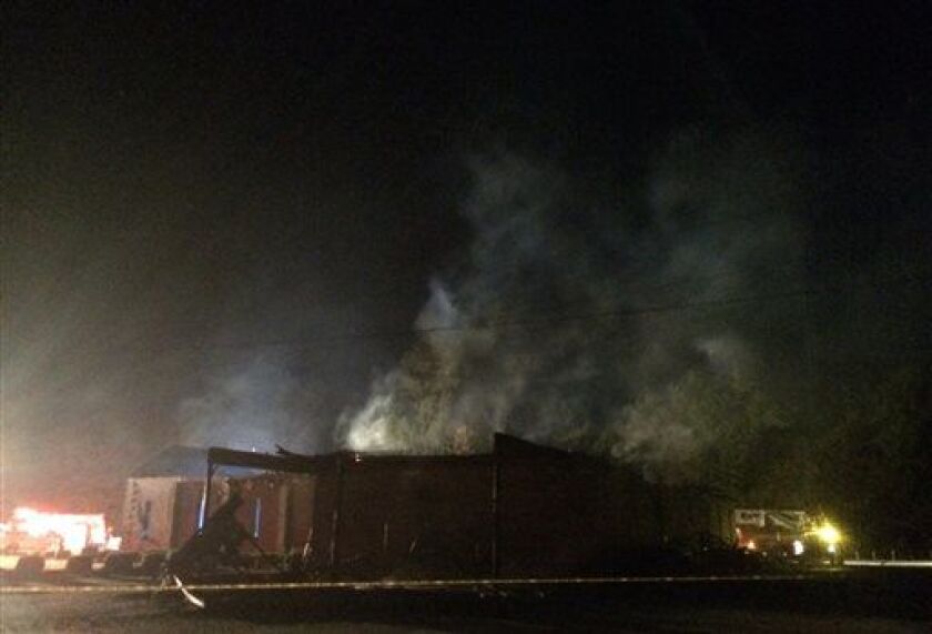 Smoke rises from Mount Zion AME Church early Wednesday, July 1, 2015, in Greeleyville, S.C. | Veasey Conway/The Morning News via AP