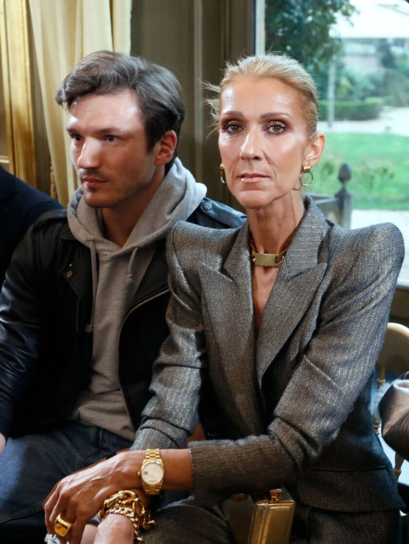 Celine Dion and Spanish dancer Pepe Munoz arrive for the 2019 Spring-Summer Haute Couture collection fashion show by RVDK Ronald van der Kemp in Paris, on January 23, 2019. | FRANCOIS GUILLOT/AFP/Getty Images
