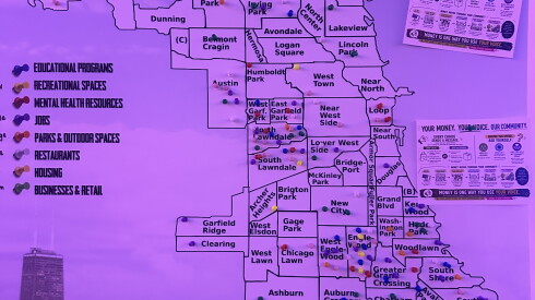 A map of Chicago's 77 communities is displayed.