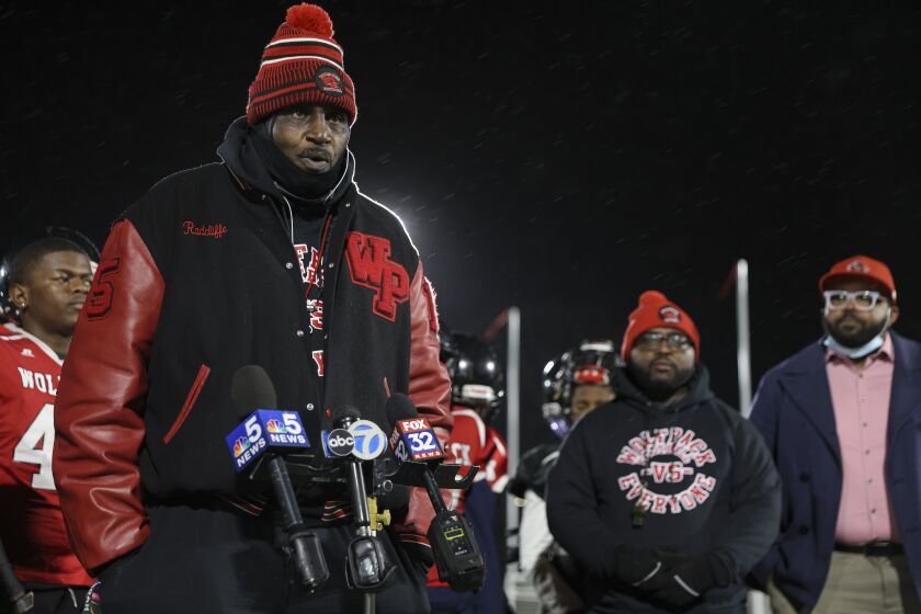 Wolfpack coach Earnest Radcliffe thanks the community for donating to help get the team to the national championships in Florida.