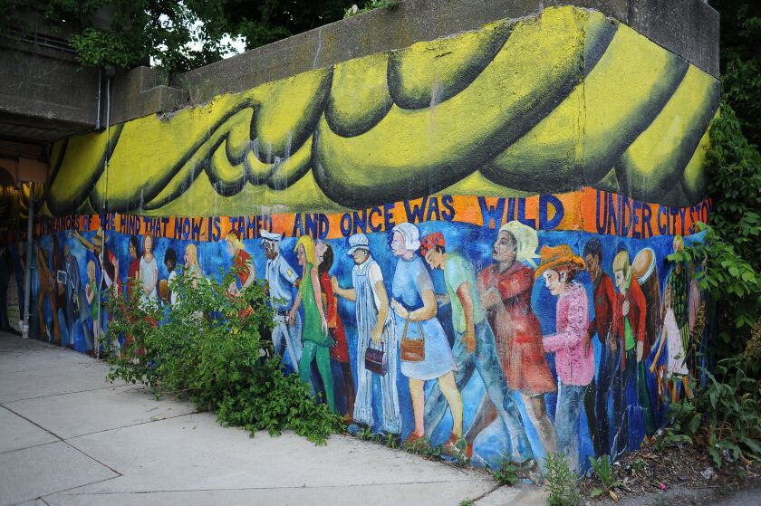 A colorful mural next to the Metra bridge located at Lake Park Avenue and 55th Street in Hyde Park, Chicago. | Victor Hilitski/For the Sun-Times