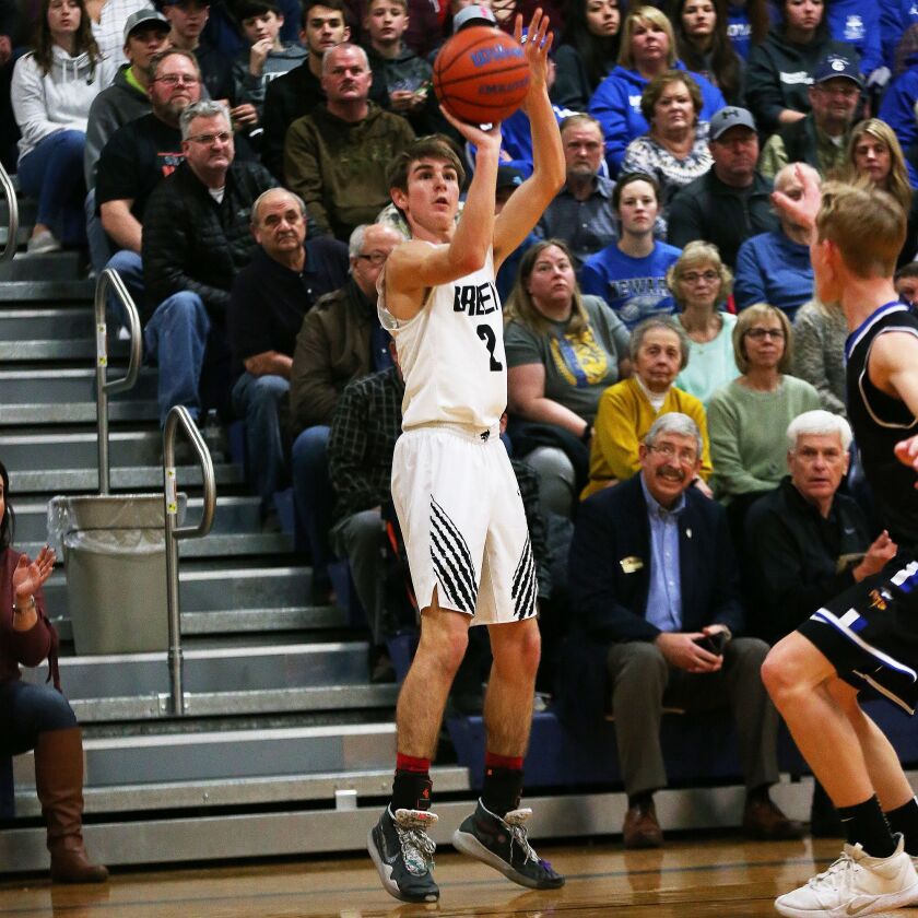 Indian Creek’s Cameron Russell hits a three as the Timberwolves play Newark in the Little Ten Conference Championship game last season.