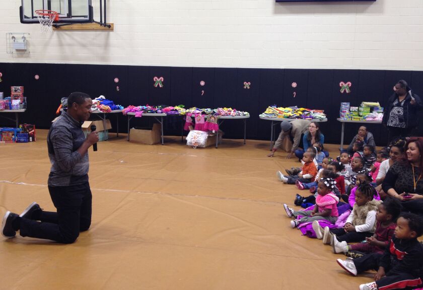 Former NBA player Isiah Thomas grew up on Chicago’s West Side, and plays Santa to neighborhood children every year. | Maudlyne Ihejirika/Sun-Times