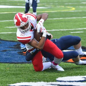 Marist’s Nile Hill (21) makes a first down. Worsom Robinson/For the Sun-Times.