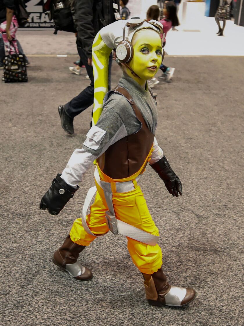 A young fan participates in the Star Wars Celebration in Chicago on April 11, 2019. Fans from all over the world gather in Chicago to celebrate the cultural phenomenon of the “Star Wars” franchise. | KAMIL KRZACZYNSKI/AFP/Getty Images