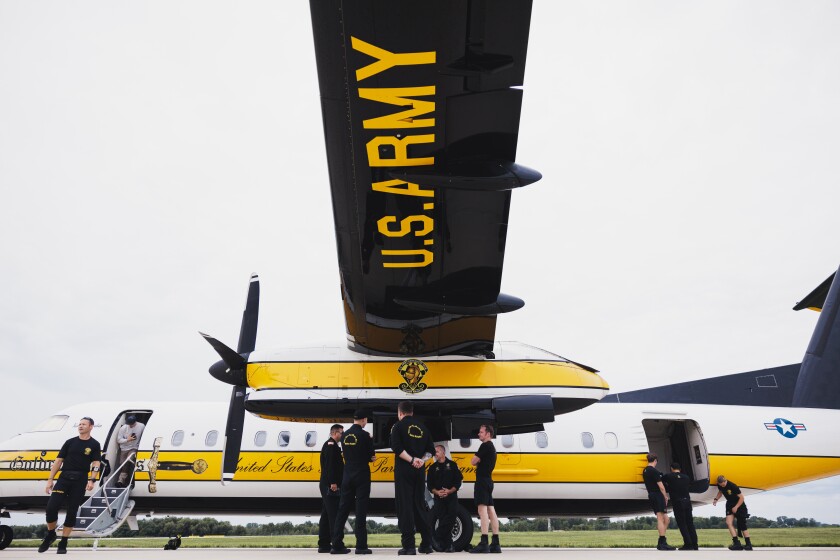Members of the Golden Knights Black Demonstration Team wait for the go ahead to board their plane for the Chicago Air and Water Show performance at Gary Jet Center in Gary, Indiana, Sunday, Aug. 17, 2025. | Anthony Vazquez/Sun-Times