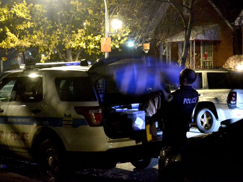 Police investiate the fatal stabbing of a 33-year-old man Friday morning in the 800 block of North Harding Jackson. Justin Jackson/Sun-Times