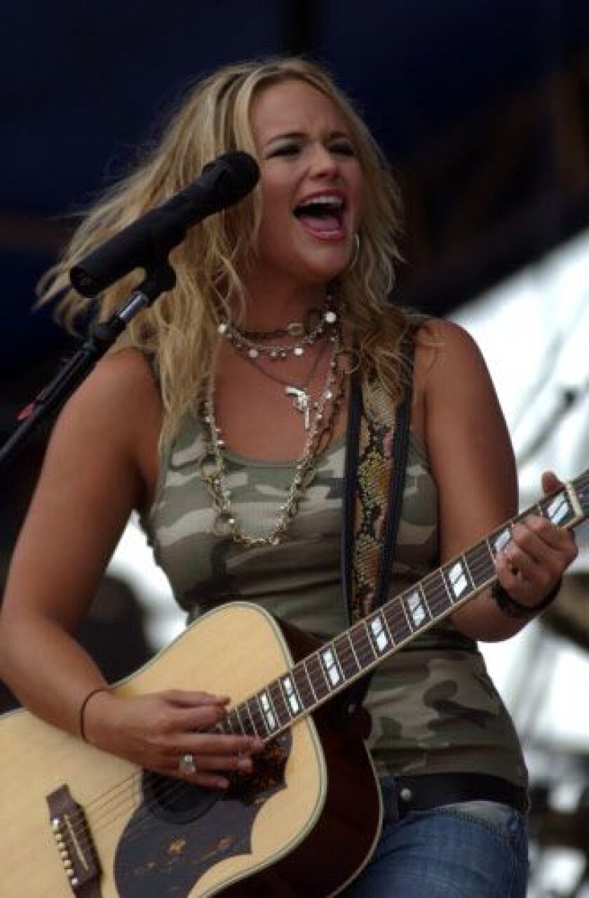 Country music star Miranda Lambert had fun on stage at Country Thunder in Twin Lakes, Wisc. | Michael Stonacek/Staff Photographer