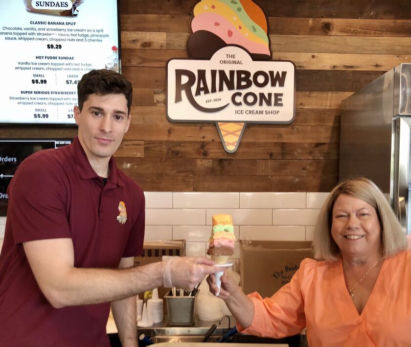 Lynn Sapp, granddaughter of Original Rainbow Cone founders Joe and Katherine Sapp, and Navy Pier location manager Nikola Nonkovic.