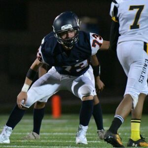 Payton’s Ryan Pilcher (73) throws a block against on Clark’s Jerrick Linzy (7). Worsom Robinson/For the Sun-Times.