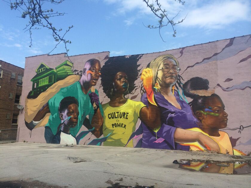 “Culture is Power,” one of Max Sansing’s largest murals, focuses on family.