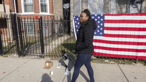 Tosheika Thomas walks through her childhood neighborhood of West Garfield in Chicago on November 1, 2025. | Manuel Martinez/WBEZ