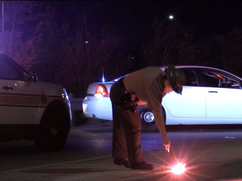 State police investigate the scene of a shooting Friday morning in the northbound lanes of the I-57 Expressway near 119th Street.