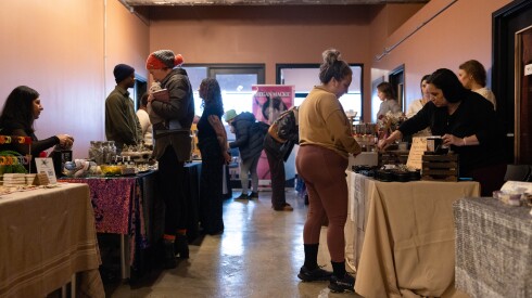 Shoppers check out the vendors at Wildlight Yoga’s Mindful Market in the Portage Park neighborhood on the Northwest Side, Saturday, Nov. 29, 2025.