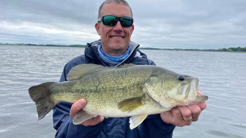 Mike Bailey of Mount Prospect with a 4-pound largemouth bass on a guide outing with Mike Norris. Provided photo