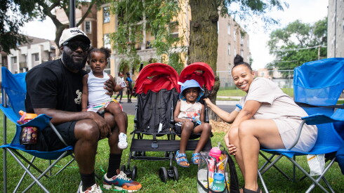 Devon and Jasmine Hughes with their children during the 97th Bud Billiken Parade in Bronzeville on Saturday, Aug. 8, 2026.