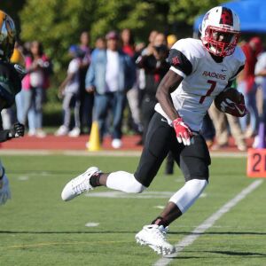 Raby’s Marshawn Foster (7) gains yards. Allen Cunningham/For the Sun-Times.