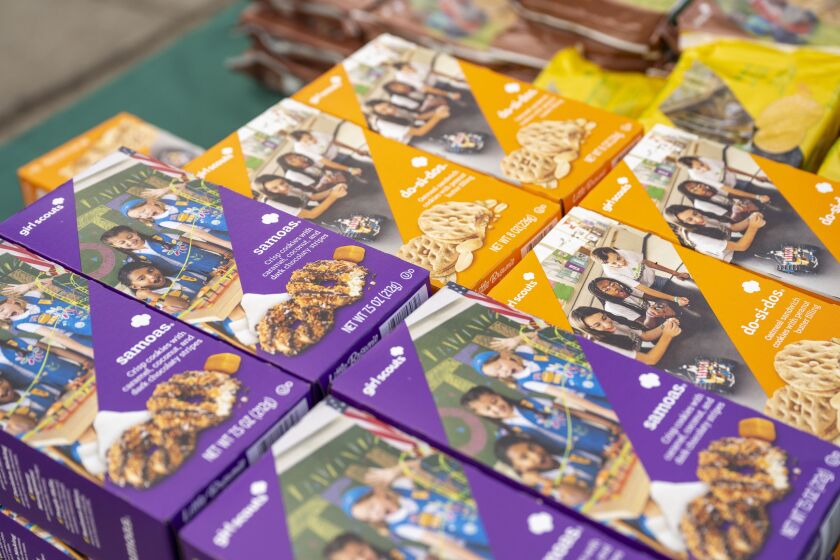 Boxes of Girl Scouts cookies sit on a table outside Jordan Banks, 18, and her mother Candice Banks Evanston home near Sheridan Road and South Boulevard, Monday, Feb. 5, 2024 in Evanston, Ill. Jordan who’s in her final year of Girl Scouts as an Ambassador, is raising money for a Gold Award and hopes to have a friendship bench installed in a nearby middle school. | Tyler Pasciak LaRiviere/Sun-Times