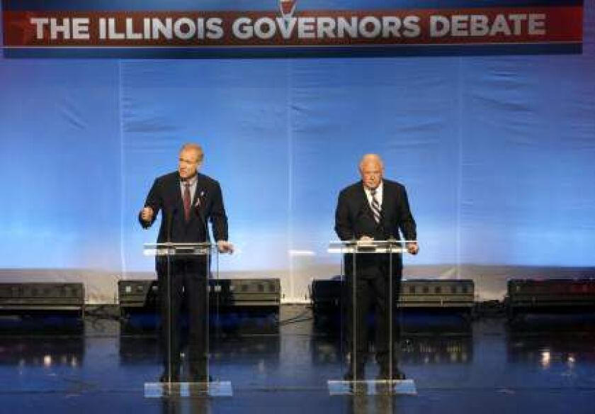 <small><strong>Gubernatorial candidates Republican Bruce Rauner, left, and Democrat Gov. Pat Quinn debate at the DuSable Museum of African American History, Tuesday. | AP Photo/Charles Rex Arbogast</strong></small>