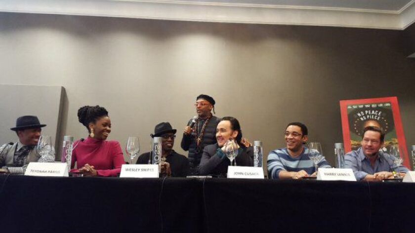 Nick Cannon (from left), Teyonah Parris, Wesley Snipes, Spike Lee, John Cusack, Harry Lennix and D.B. Sweeney in Chicago on Monday, Nov. 23, 2015. | PHOTO BY MIRIAM DI NUNZIO