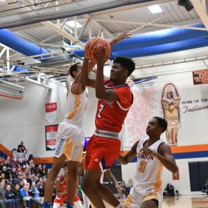 Curie’s Damari Nixon (2) dodges Simeon’s Jaylen Granger (24) in a game in December. Worsom Robinson/For Sun-Times