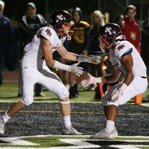 Brother Rice’s Dylan Summers (13) celebrates. Allen Cunningham/For the Sun-Times.