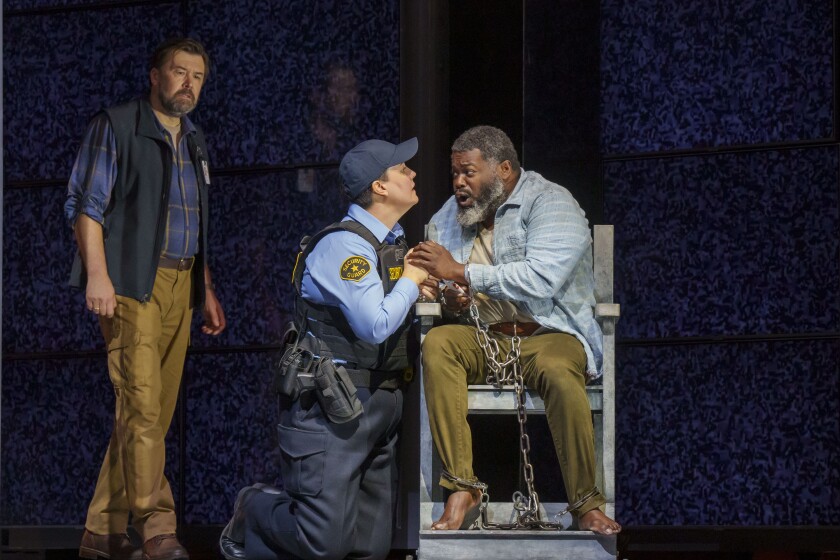 Dimitry Ivashchenko as Rocco, Elza van den Heever, Leonore and Russell Thomas, Florestan perform in Lyric Opera's production of Beethoven’s 'Fidelio.'