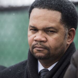 Aurora Mayor Richard Irvin cries during a prayer vigil for the five people killed two days earlier in a mass shooting at the Henry Pratt Company, Sunday afternoon, Feb. 17, 2019. | Ashlee Rezin/Sun-Times