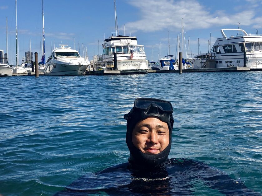 Yohei Yamada in Lake Michigan at Burnham Harbor.