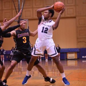 DePaul Prep’s Darren Shower (12) holds the ball. Worsom Robinson/For the Sun-Times.