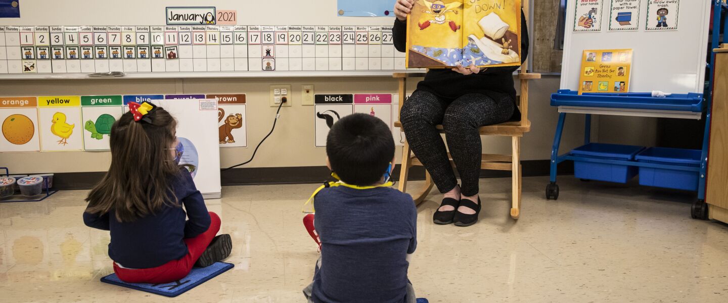 Preschool teacher Angela Panush reads a story to her students at Dawes Elementary School at 3810 W. 81st Pl. on the Southwest Side.