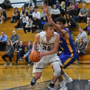 Lemont’s Kyle Lillwitz (35) gets fouled by Khaled Salah (4). Worsom Robinson/For the Sun-Times.